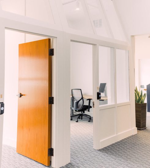 Light-filled coworking space in downtown Ann Arbor, featuring private offices.