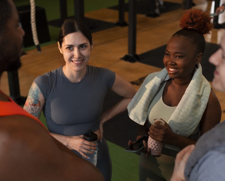 side-view-people-training-together-gym